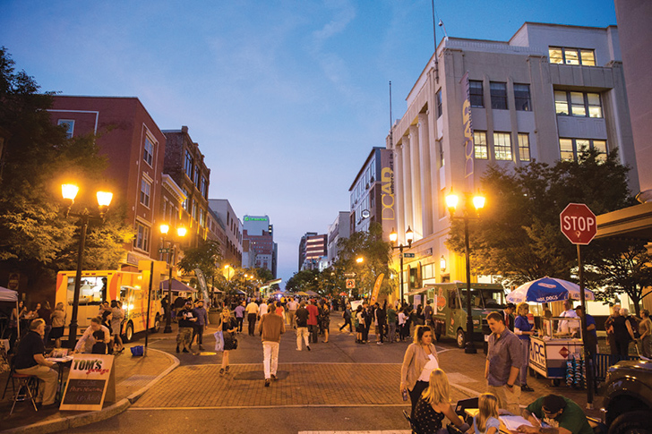 The ribbon cutting event coincided with Tuned-IN Wilmington Block Party, which featured live music, food vendors, yard games, and more than 33 organizations and artists' booths. // Photo ©2015 Matt Urban