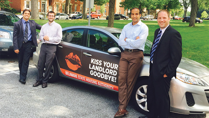 Carvertise founders Mac Nagaswami (from left) and Greg Star worked out a campaign with Anas Ben Addi and Matt Heckles of the Delaware State Housing Authority. (Photo courtesy of Carvertise)