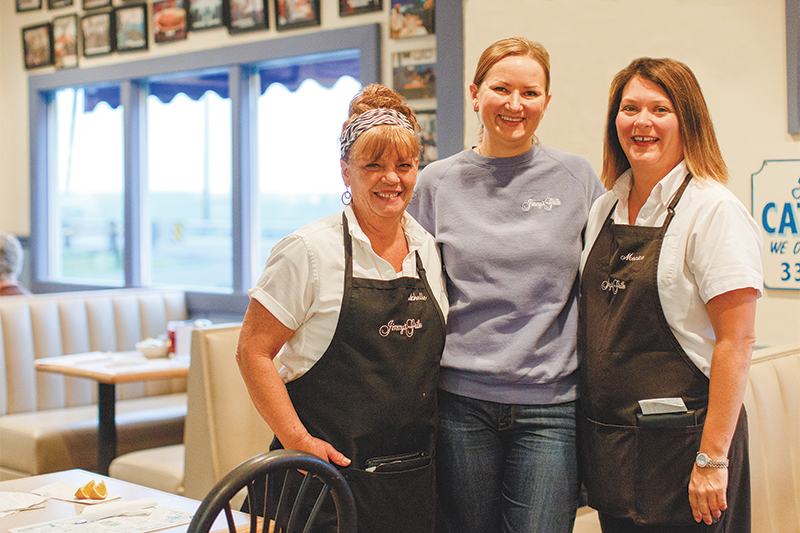 Waitress Michelle Dolly (from left), Manager Yelena Kretova and waitress Monica Layton work at Jimmy's.