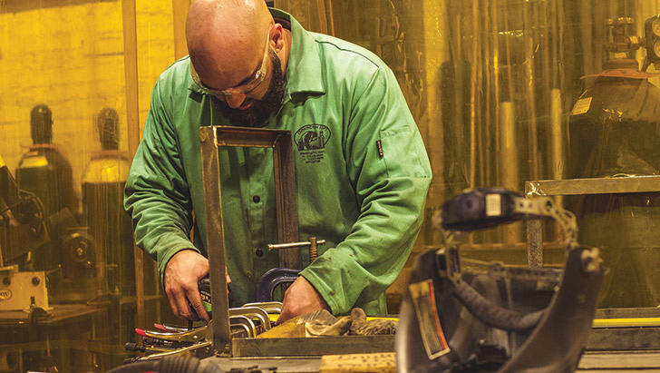 Jeff Brown, a NextFab member, uses an old-school metal-working machine that might have been in use in the 1930s.//Photos by Brian Harvath.